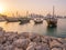 Traditional boats called Dhows are anchored in the port