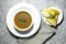 traditional bowl of spiced algerian vegetable soup named (Harira) and meat bourak named bourek