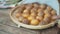 Traditional Brazilian cheese bread with sweet potatoes in a basket