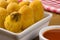 Traditional Brazilian fried fritter made of kabocha squash stuffed with jerked beef with one open close