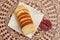 Traditional Brazilian homemade bread. Sliced on top of a white plate.