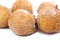 Traditional Brazilian mini fried cakes called bolinho de chuva isolated in white background close