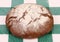 Traditional bread on check tablecloth