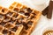 Traditional breakfast: coffee, belgian waffles with honey and chocolate sauce