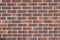 Traditional brick wall texture in rusty brown colors