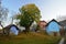 Traditional Brightly painted wooden sheds and stores at Hervartov, Slovakia