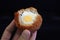Traditional british food. Half eaten Scotch egg. Hard boiled-egg wrapped in sausage meat coated in bread crumbs and baked or deep