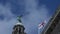 Traditional buildings in Liverpool city center liver bird and St George flag