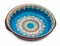 Traditional Bulgarian hand made, ornated, rich decorated, colorful painted ceramic dish isolated on white