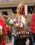 Traditional Bulgarian kuker man with his giant colorful evil mask