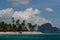 Traditional bungalow on tropic island in blue lagoon