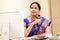 Traditional business woman thinking at her desk