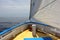 Traditional Caribbean Sloop, Sail and Prow view of Caribbean Ocean.