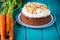 Traditional carrot cake and fresh carrots