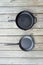 Traditional cast iron vs carbon steel versus teflon cooking options - copy space