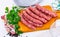 Traditional Catalan raw pork sausage longaniza ready for grilling
