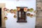 Traditional ceramic plates displayed on a building wall in the old town, Ronda, Spain.