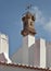 Traditional chimney in the shape of the Torre of Belem on a housetop