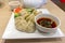Traditional Chinese Boiled Dumpling With Hot Dipping Sauce