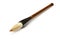 Traditional Chinese calligraphy brush lying on a white background