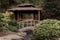 Traditional Chinese courtyard with decorative bonsai plants, gazebo in the background.