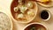 Traditional chinese dumplings served in the wooden bamboo steamer