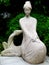 Traditional Chinese lady and deer sculpture in guyi garden
