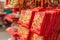 Traditional Chinese new year decorations on red background that says good luck and happiness