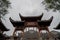 Traditional chinese style arch with overcast sky
