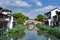 Traditional Chinese teahouses and buildings along the riverbank of the Puhui River in Qibao Ancient Town in Shanghai, China