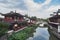 Traditional Chinese teahouses and buildings along the riverbank of the Puhui River in Qibao Ancient Town in Shanghai, China