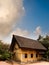 Traditional Chinese wooden house under blue sky