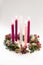 Traditional christian religious advent wreath with 5 candles, 4 candles burning