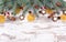 Traditional Christmas banner with blue spruce branches, gingerbread cookies, rose hips, cinnamon sticks and dried oranges on a