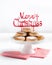 Traditional Christmas cookies, nevaditos, with almonds and sesame on white wooden background with copy space. Close up. Christmas