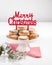 Traditional Christmas cookies, nevaditos, with almonds and sesame on white wooden background with copy space. Close up. Christmas