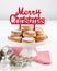 Traditional Christmas cookies, nevaditos, with almonds and sesame on white wooden background with copy space. Close up. Christmas