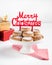 Traditional Christmas cookies, nevaditos, with almonds and sesame on white wooden background with copy space. Close up. Christmas