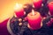 Traditional Christmas decoration: Advent wreath with red lights