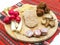 Traditional christmas plateau of various pork appetizers on traditional cloth