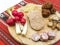 Traditional christmas plateau of various pork appetizers on traditional cloth