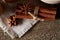 Traditional Christmas tea concept with dried oranges, cookies and decorations on a wooden table, selective focus