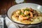 Traditional and Classic Shrimp and Grits with a Buttery Gravy