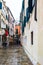 Traditional cobblestone street and colorful buildings in Venice, Italy