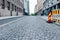 Traditional cobblestone street in Europe. Common stone street pavement in Europe