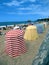 Traditional and colored beach tents on daily rental for tourists.