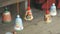 Traditional colorful festive wooden bells ringing