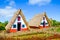 Traditional colorful houses in Santana, Madeira, Portugal. Small, wooden, triangular houses with thatched roof represent a part of