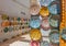 Traditional colorful Moroccan plates on the street walls of Marrakesh.