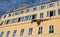 Traditional colorful painted building facade in Bastia, Corsica, France